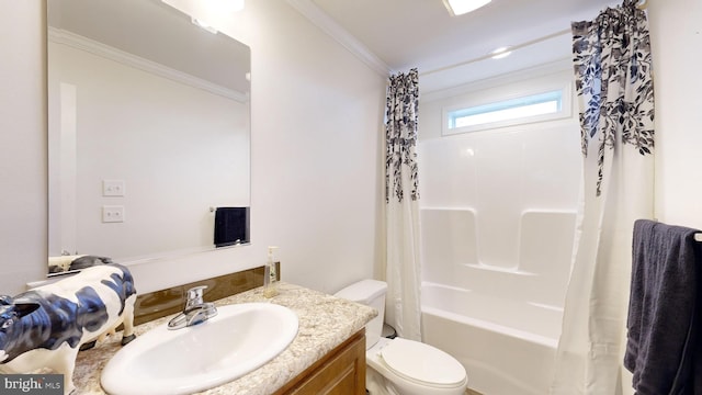 full bathroom with vanity, toilet, crown molding, and shower / tub combo with curtain