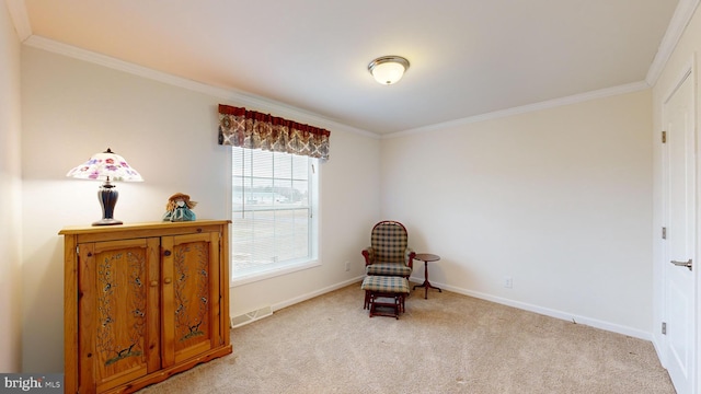 sitting room featuring light colored carpet and ornamental molding