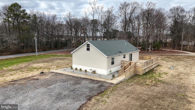 view of home's exterior with a deck