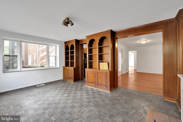 unfurnished living room with hardwood / wood-style flooring