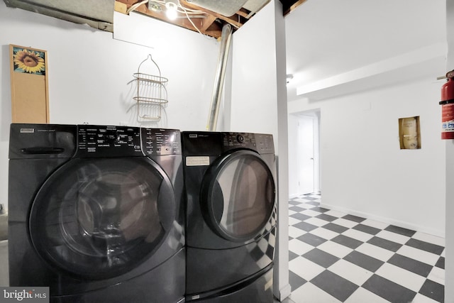 laundry area with washer and clothes dryer