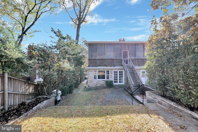 2905 Tilden St NW, Washington, DC 20008 - back of property featuring a sunroom, stairs, french doors, a patio, and stone siding