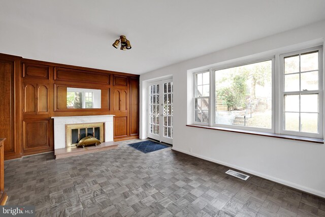 2905 Tilden St NW, Washington, DC 20008 - unfurnished living room featuring a fireplace and baseboards