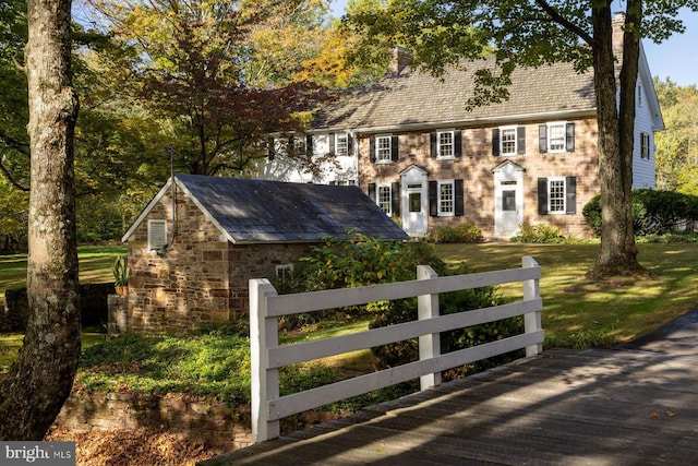 colonial house with a front yard