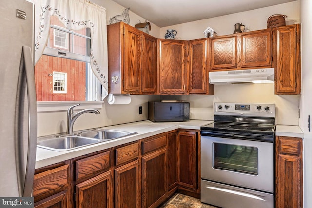 kitchen featuring stainless steel appliances and sink