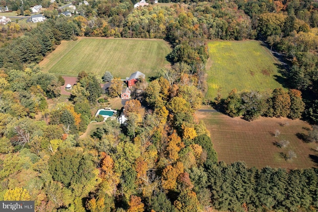 birds eye view of property featuring a rural view