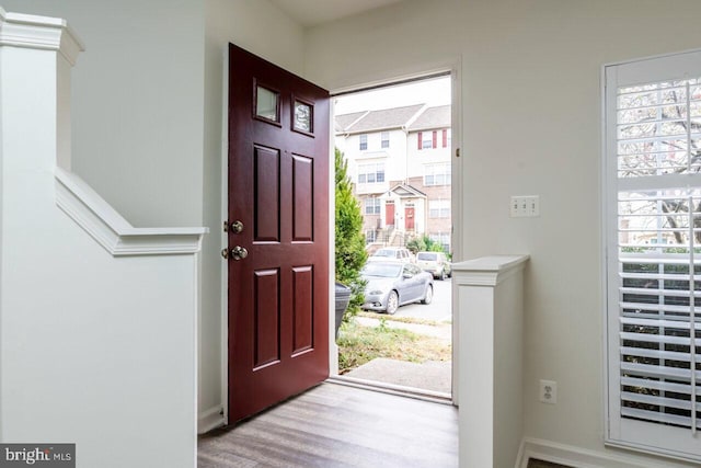 entrance foyer with light hardwood / wood-style floors