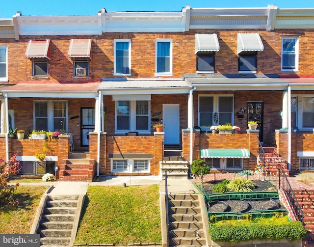 multi unit property featuring covered porch