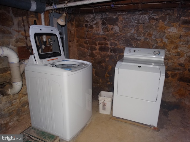 laundry room featuring washing machine and dryer