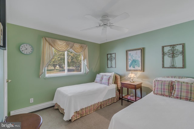 carpeted bedroom featuring ceiling fan and a baseboard heating unit