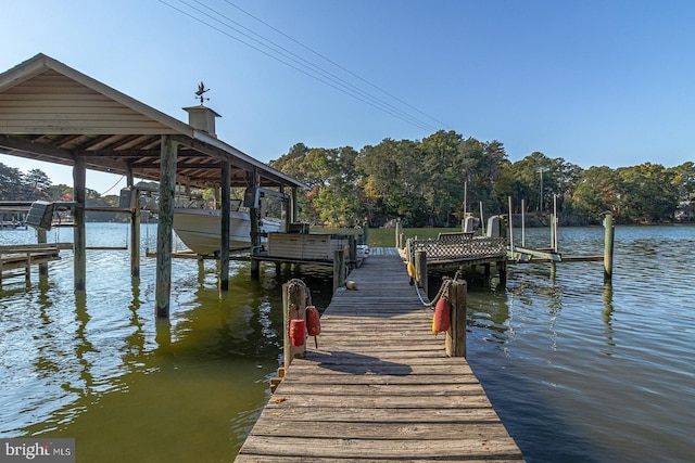 view of dock with a water view