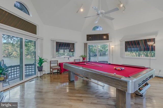 recreation room featuring pool table, wood-type flooring, high vaulted ceiling, and plenty of natural light