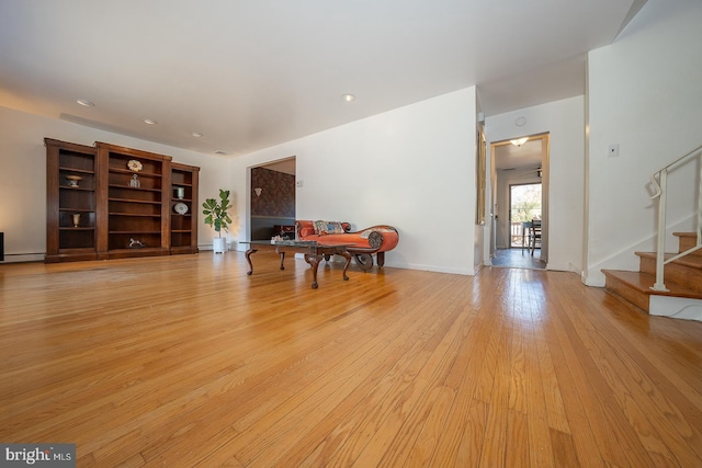 interior space with light hardwood / wood-style flooring and a baseboard radiator