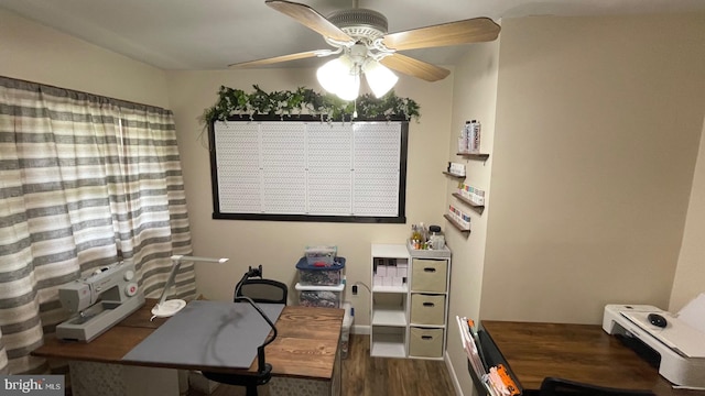 home office with dark hardwood / wood-style floors and ceiling fan