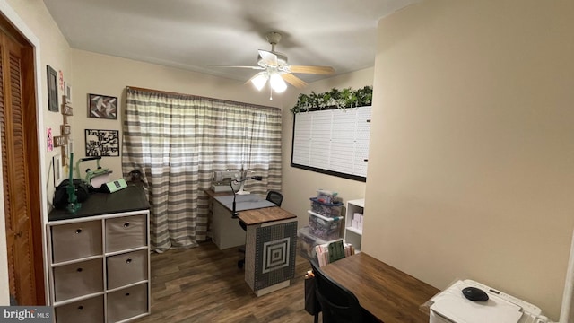 home office featuring ceiling fan and dark hardwood / wood-style floors