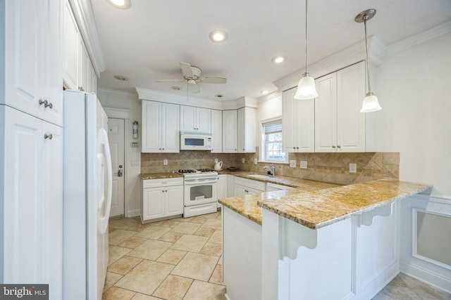 kitchen featuring kitchen peninsula, white cabinetry, pendant lighting, and white appliances