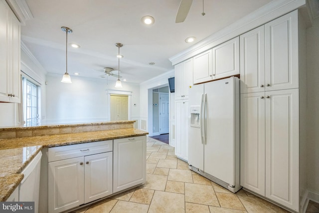 kitchen with white cabinetry, white fridge with ice dispenser, ornamental molding, and pendant lighting