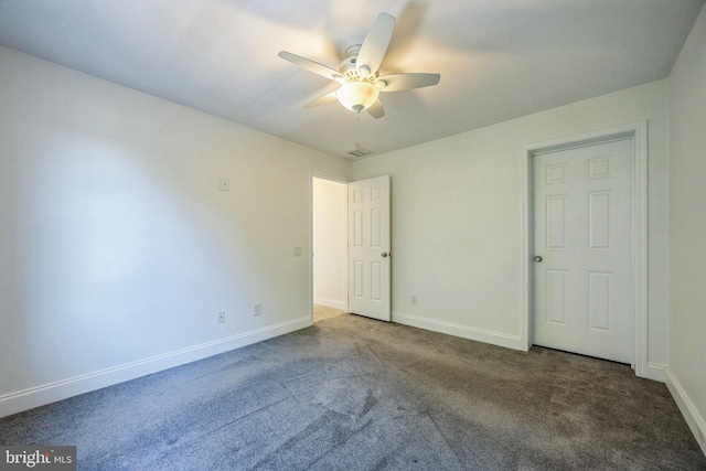 unfurnished room featuring carpet floors and ceiling fan