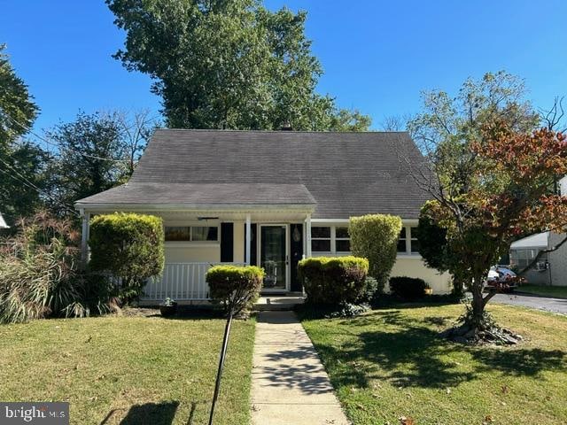 bungalow with a front lawn