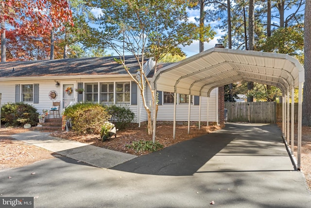 view of car parking featuring a carport