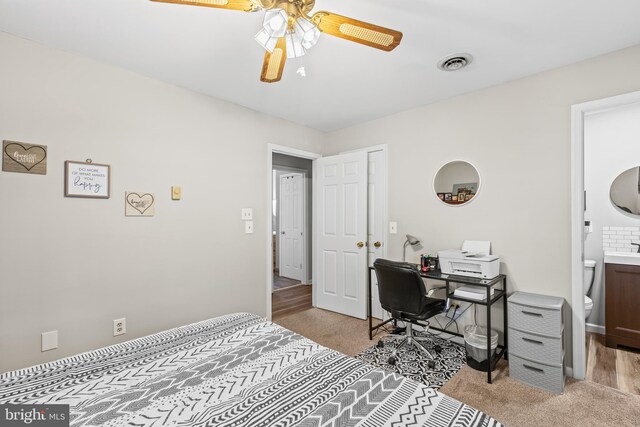 office area featuring light hardwood / wood-style floors and ceiling fan