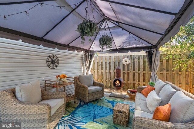 view of patio / terrace with a gazebo and an outdoor hangout area