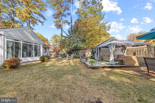 view of yard featuring a wooden deck