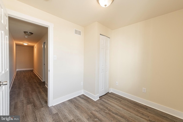 interior space with dark wood-type flooring