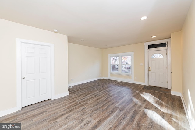 foyer entrance featuring hardwood / wood-style floors