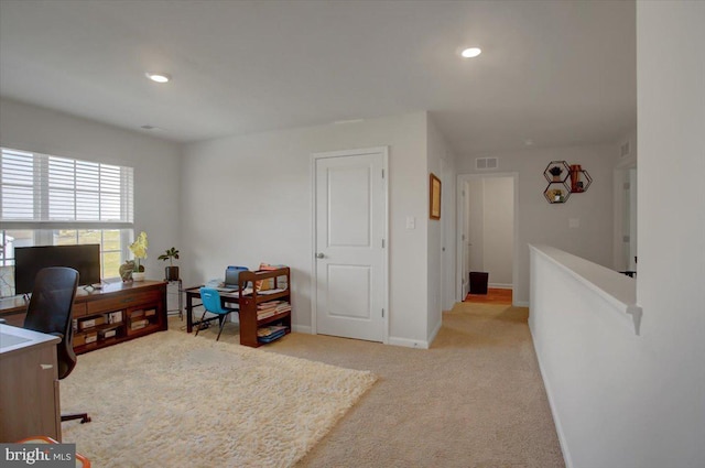 home office with light carpet