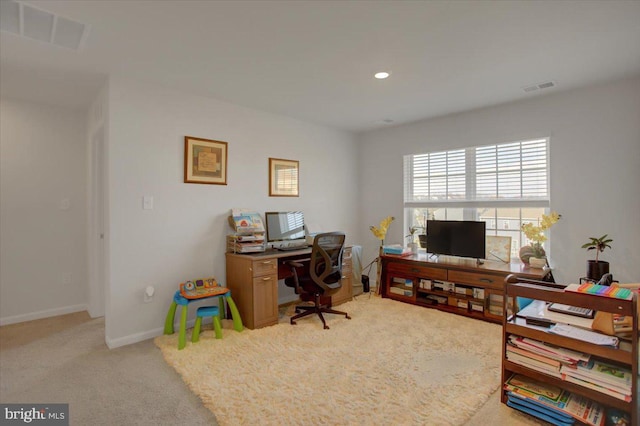 home office with light carpet