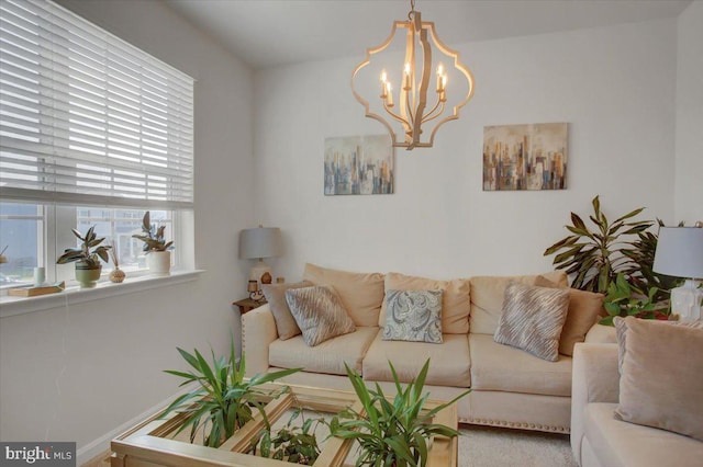 living room featuring a notable chandelier