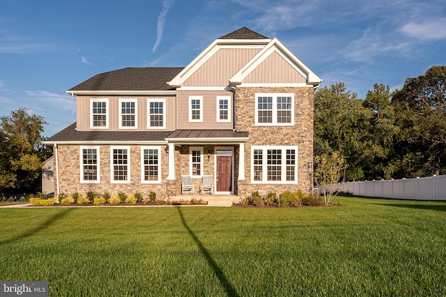 craftsman-style home with a front yard