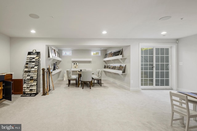 view of carpeted dining space