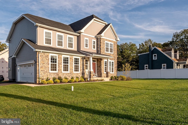 craftsman-style house with a front lawn