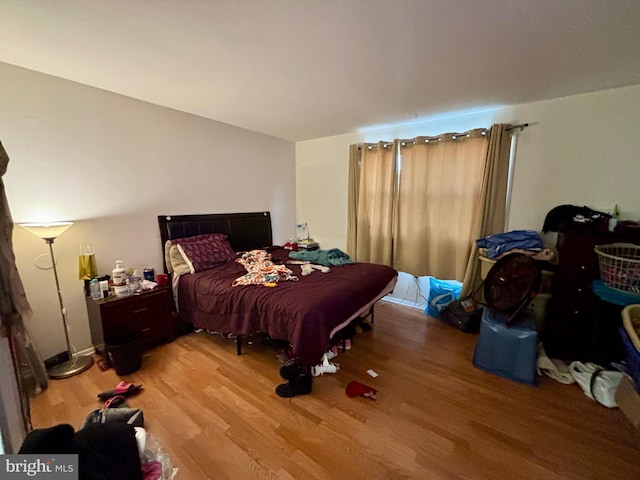 bedroom featuring light wood-style flooring