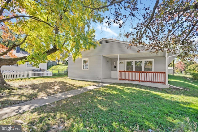 view of front of property with a front lawn