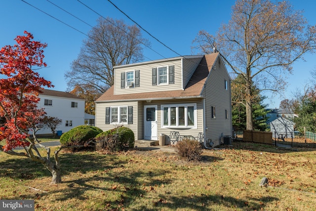 view of front of home with a front yard