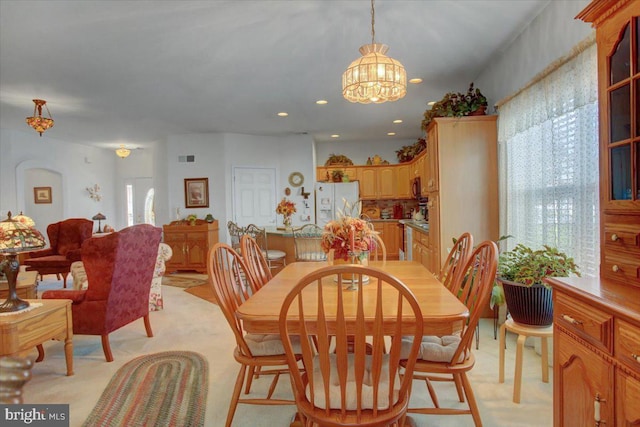 dining area featuring a chandelier