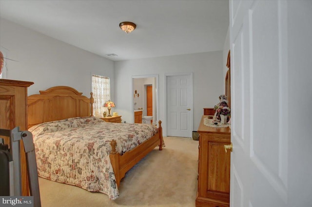 bedroom with light carpet