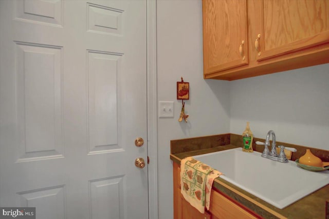 laundry area featuring sink