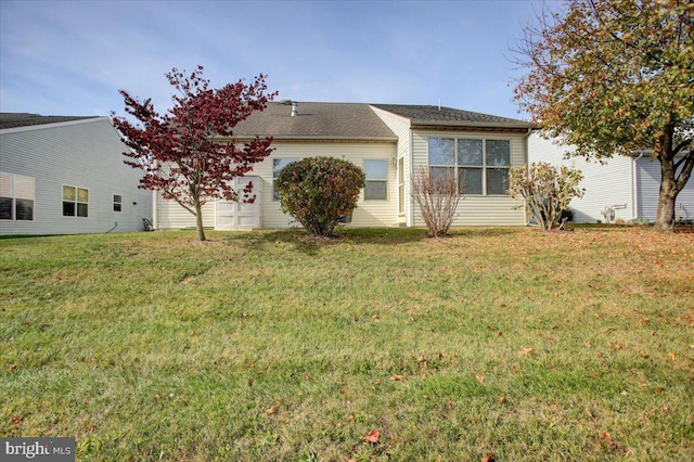 view of front of home with a front yard