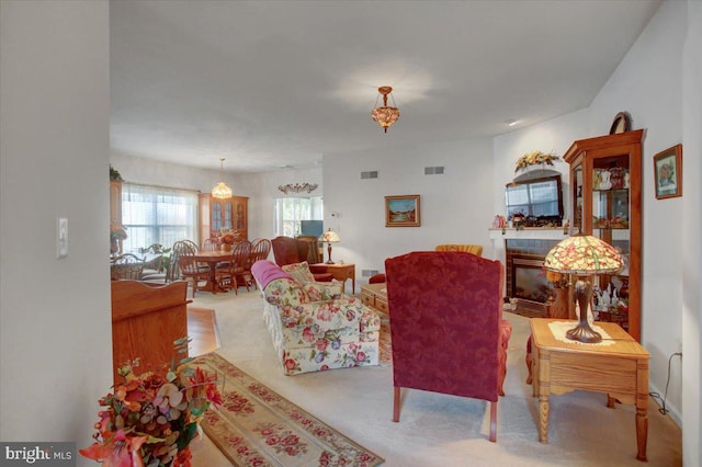 living room with light colored carpet