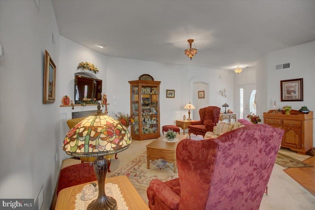 living room with light colored carpet