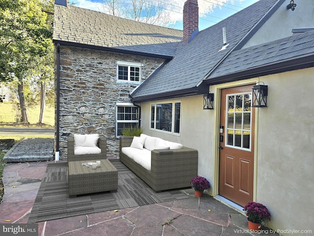 exterior space with an outdoor hangout area