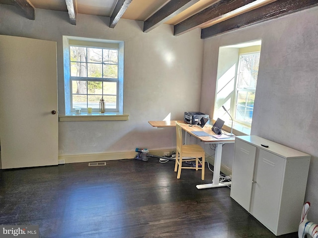 office area with dark hardwood / wood-style flooring, plenty of natural light, and beamed ceiling