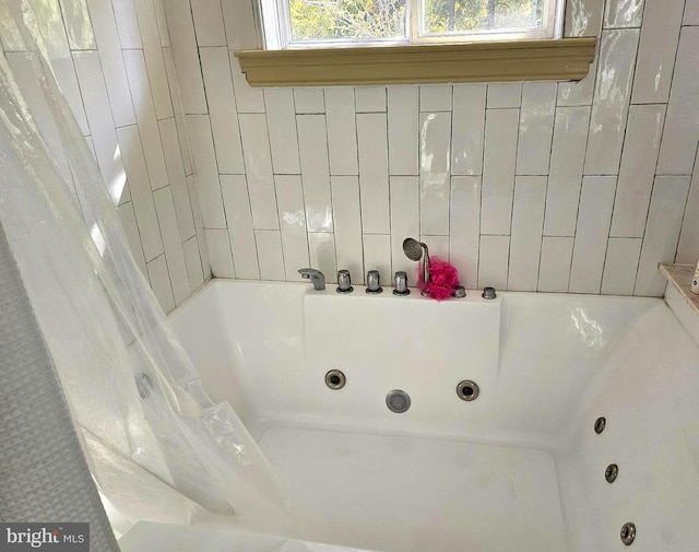 bathroom featuring a tub to relax in