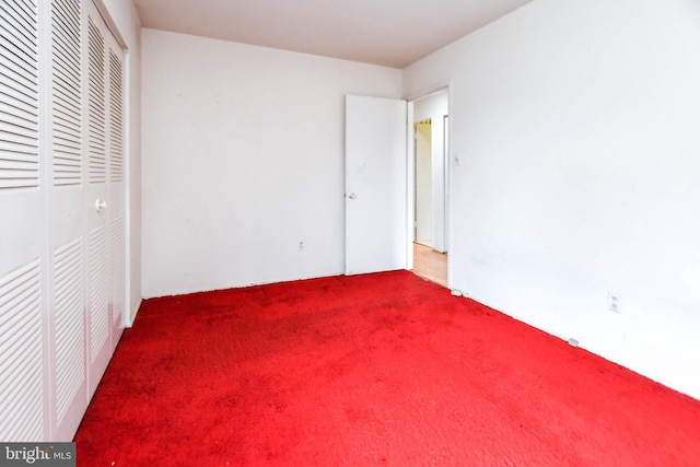 unfurnished bedroom with carpet floors