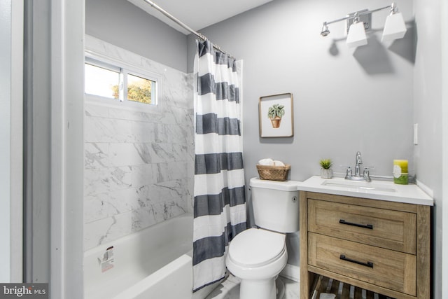 full bathroom featuring vanity, toilet, and shower / tub combo