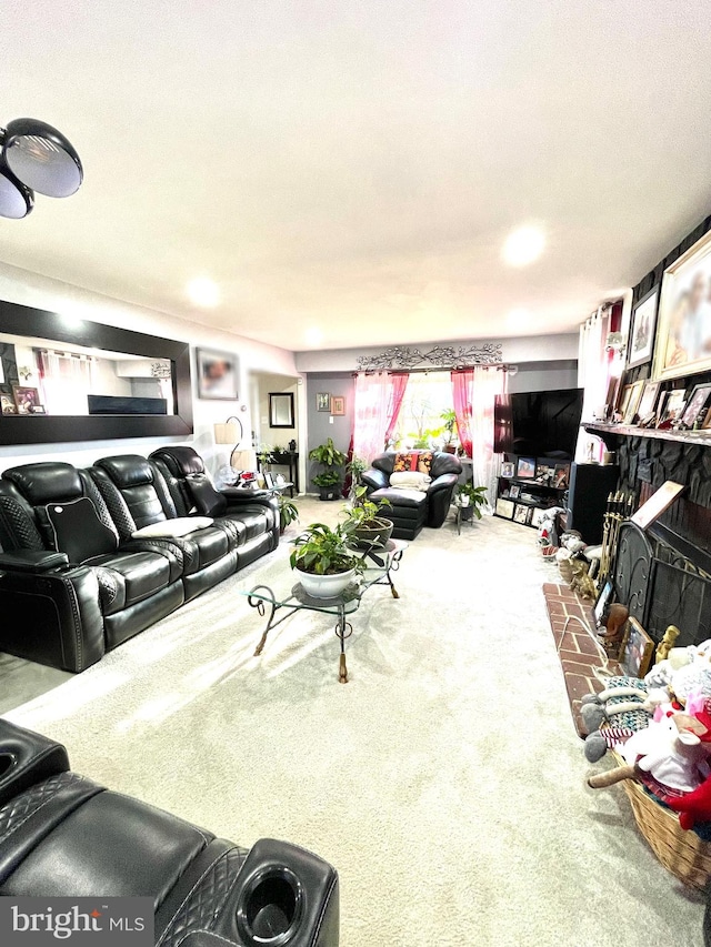 living room featuring a textured ceiling and carpet floors